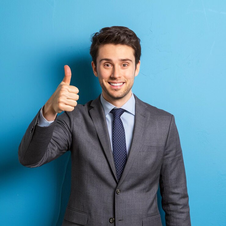 man-suit-giving-thumbs-up-sign